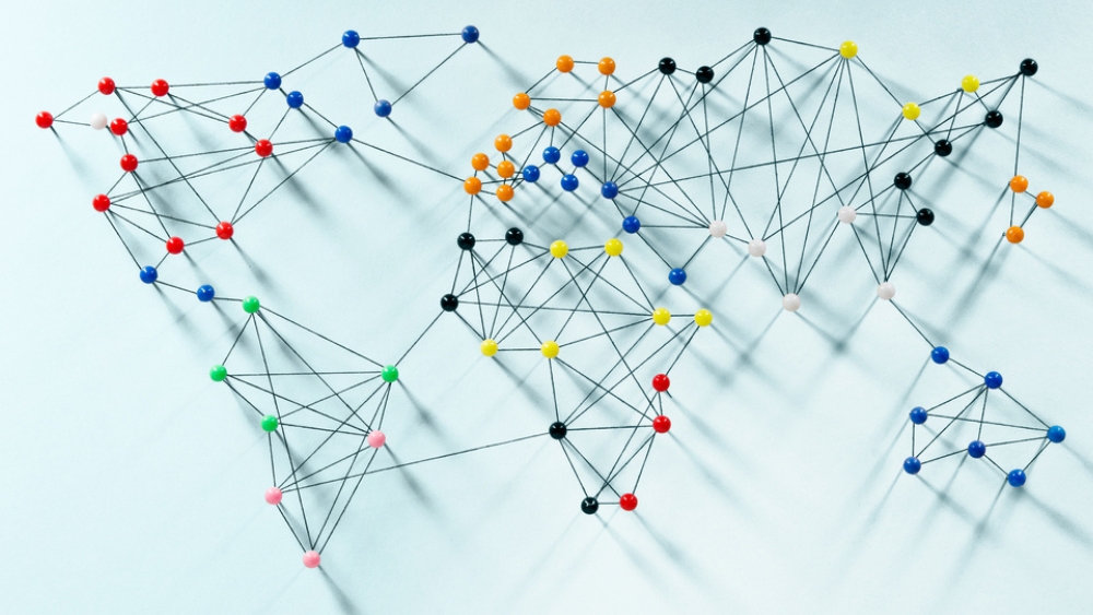 string and connecting pins designed to look like the world map - m.jpg