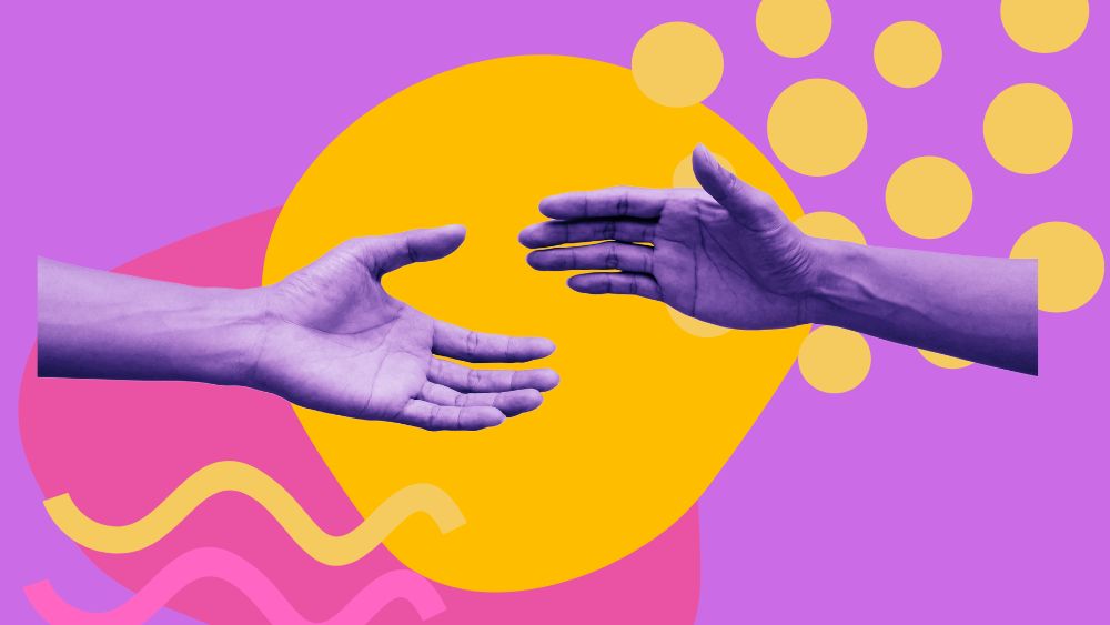 Two hands reaching towards each other against a colourful background