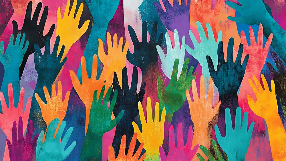Illustration of lots of multicoloured hands reaching upwards, representing community, diversity, and energy